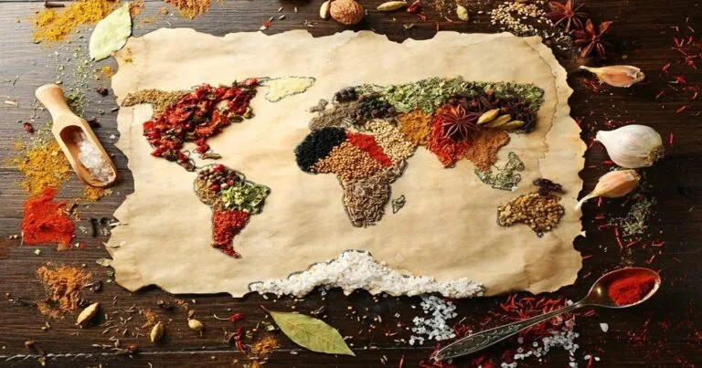 Mapa do mundo criado com especiarias variadas, representando a rica diversidade da culinária em viagens.